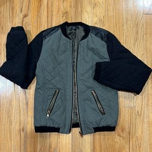Sage green with black zip up jacket
